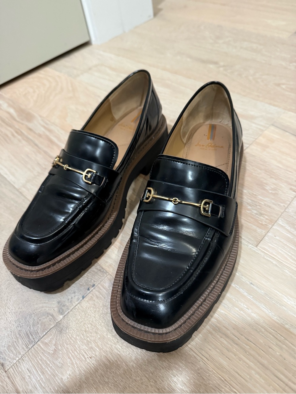 Women's Black Leather Loafers with Brown Trim